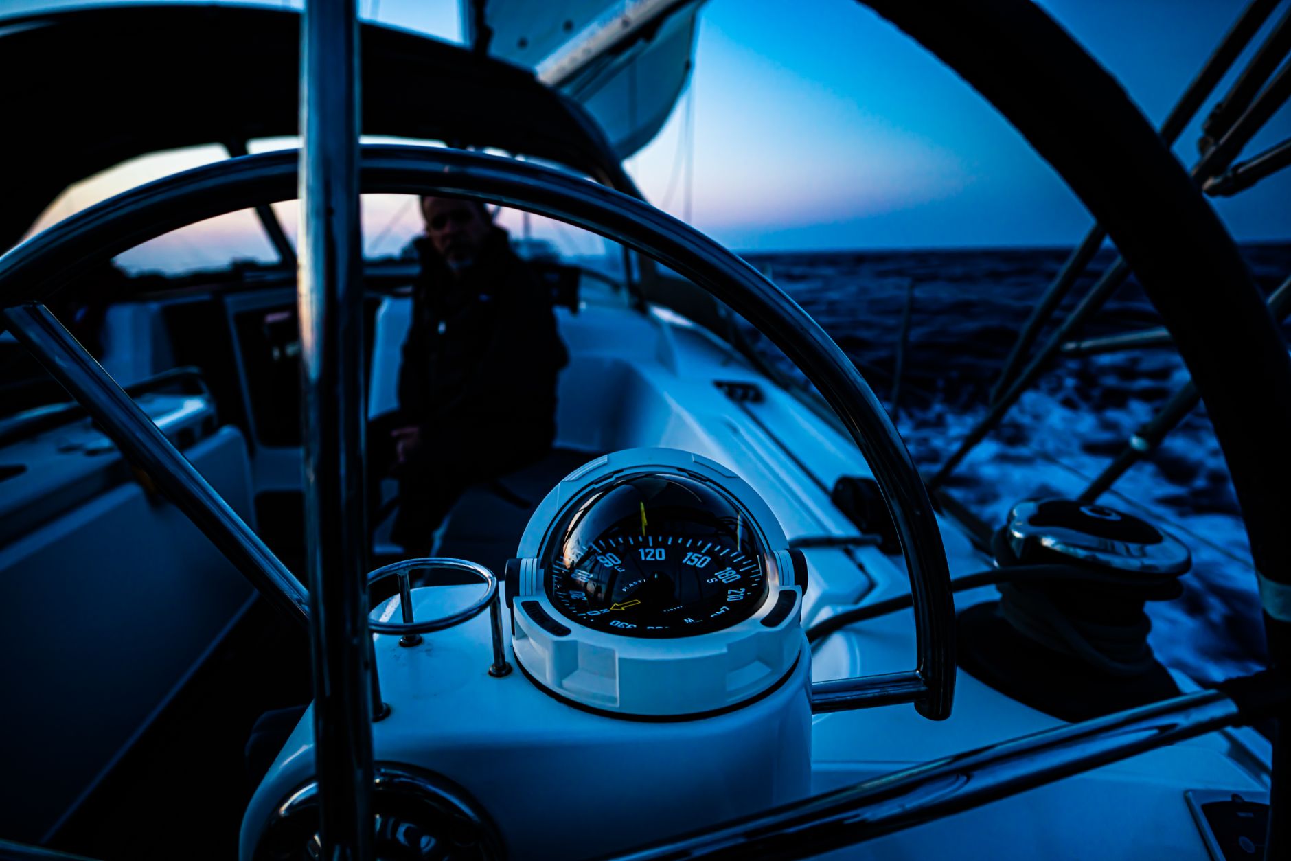 Sailboat wheel and compass representing maritime Starlink videos