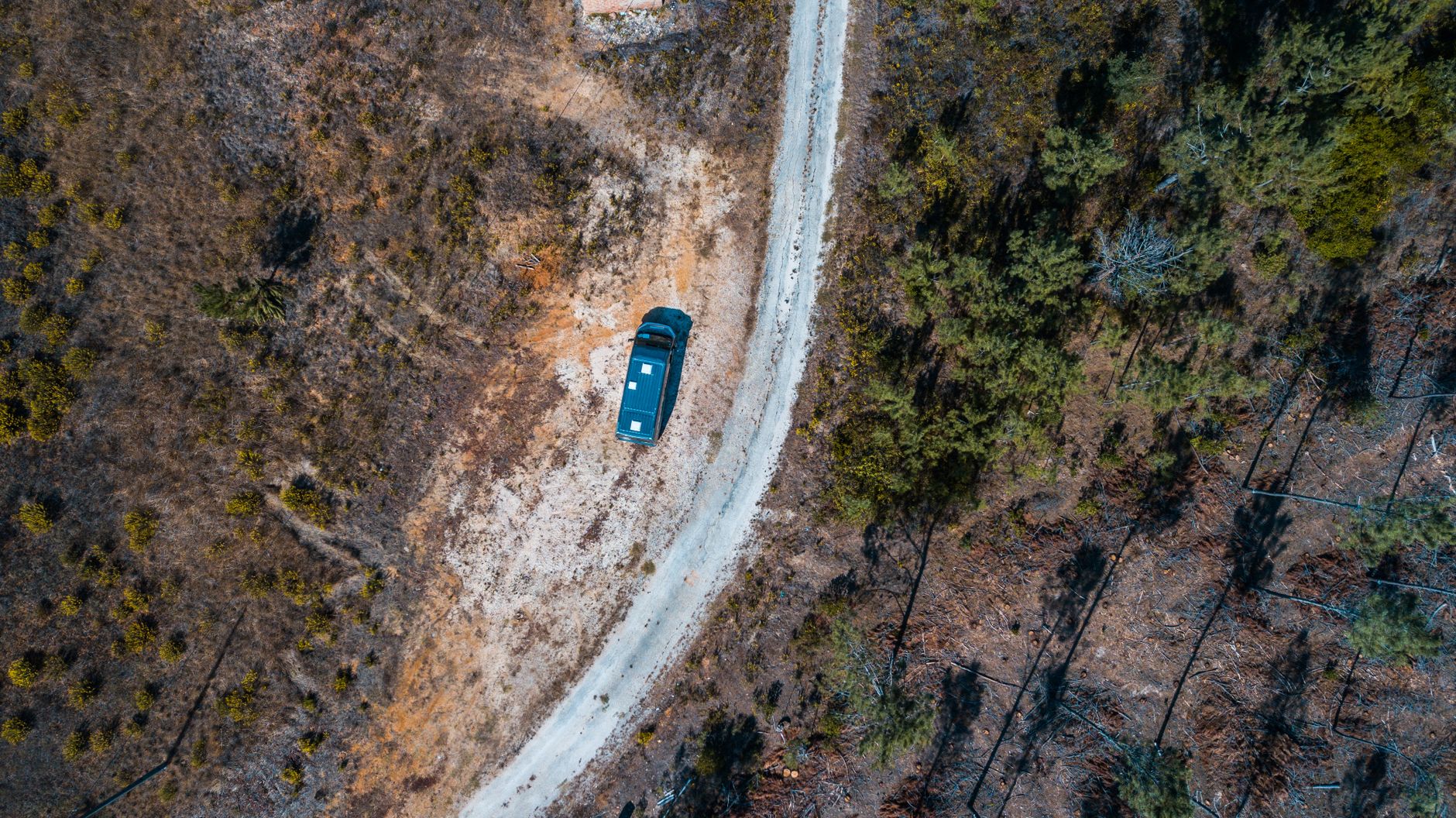 Campervan travelling on a rural road