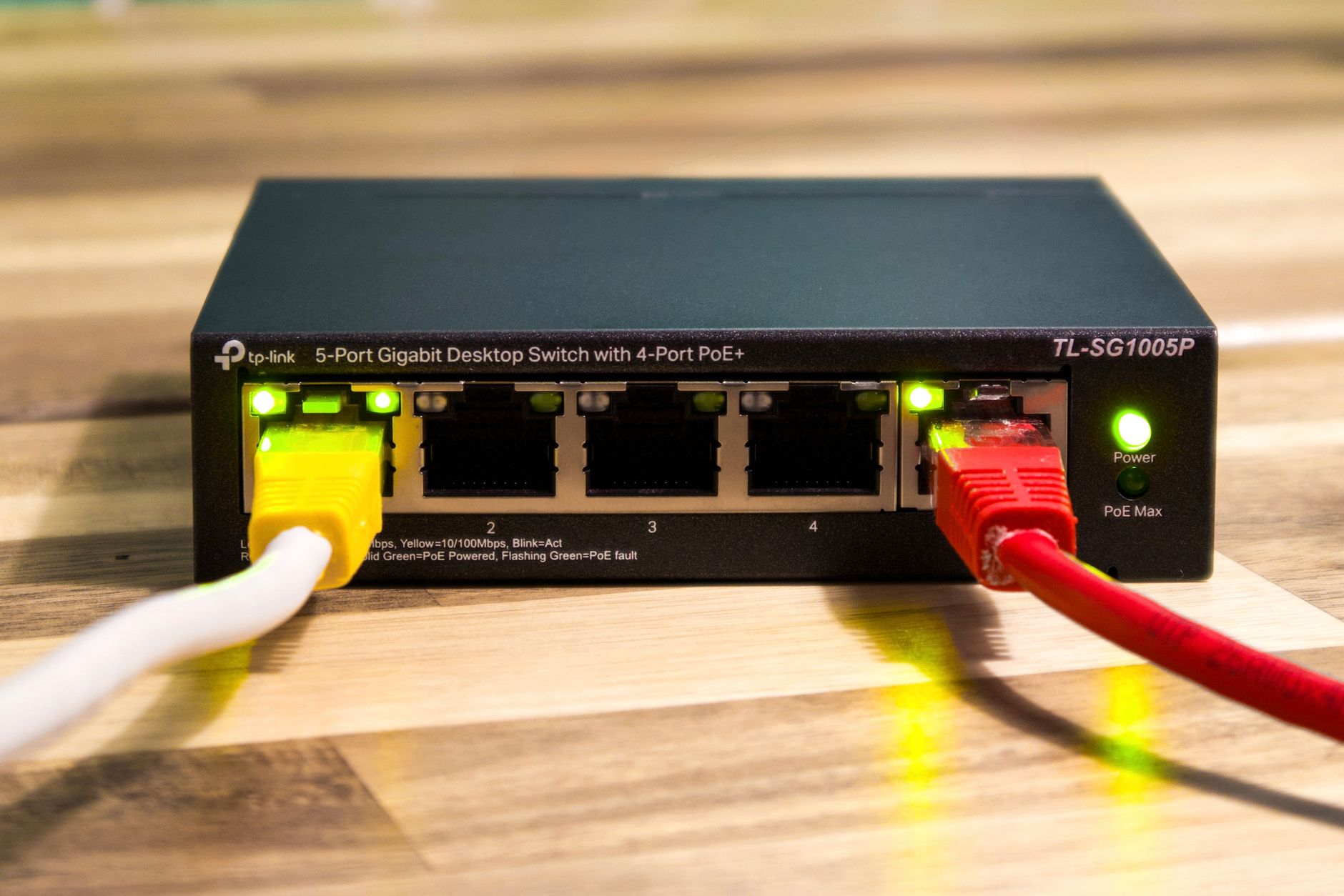 Close-up of an Ethernet switch with network cables connected