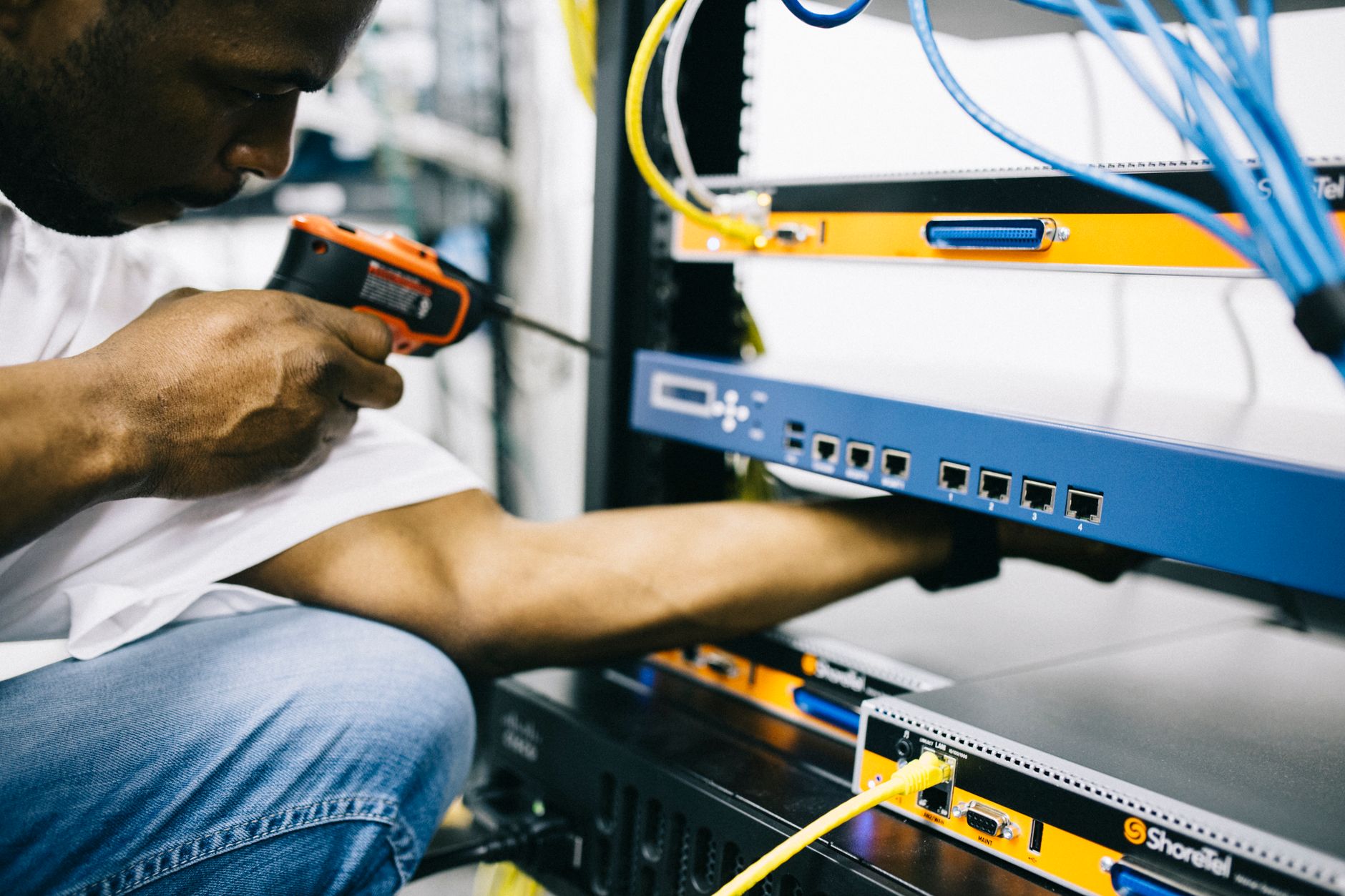 Professional technician using installation tools