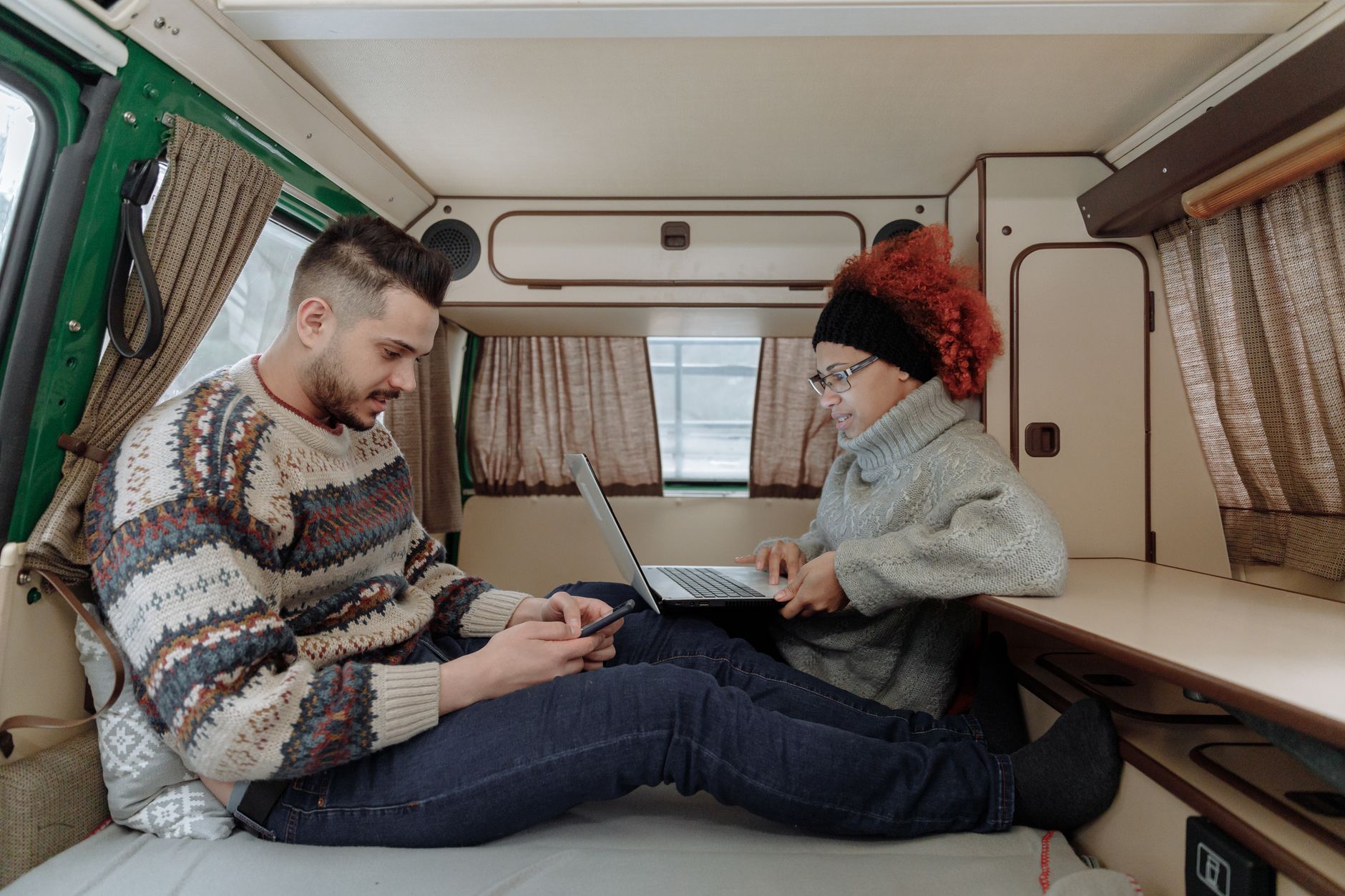 Digital nomads working from a campervan