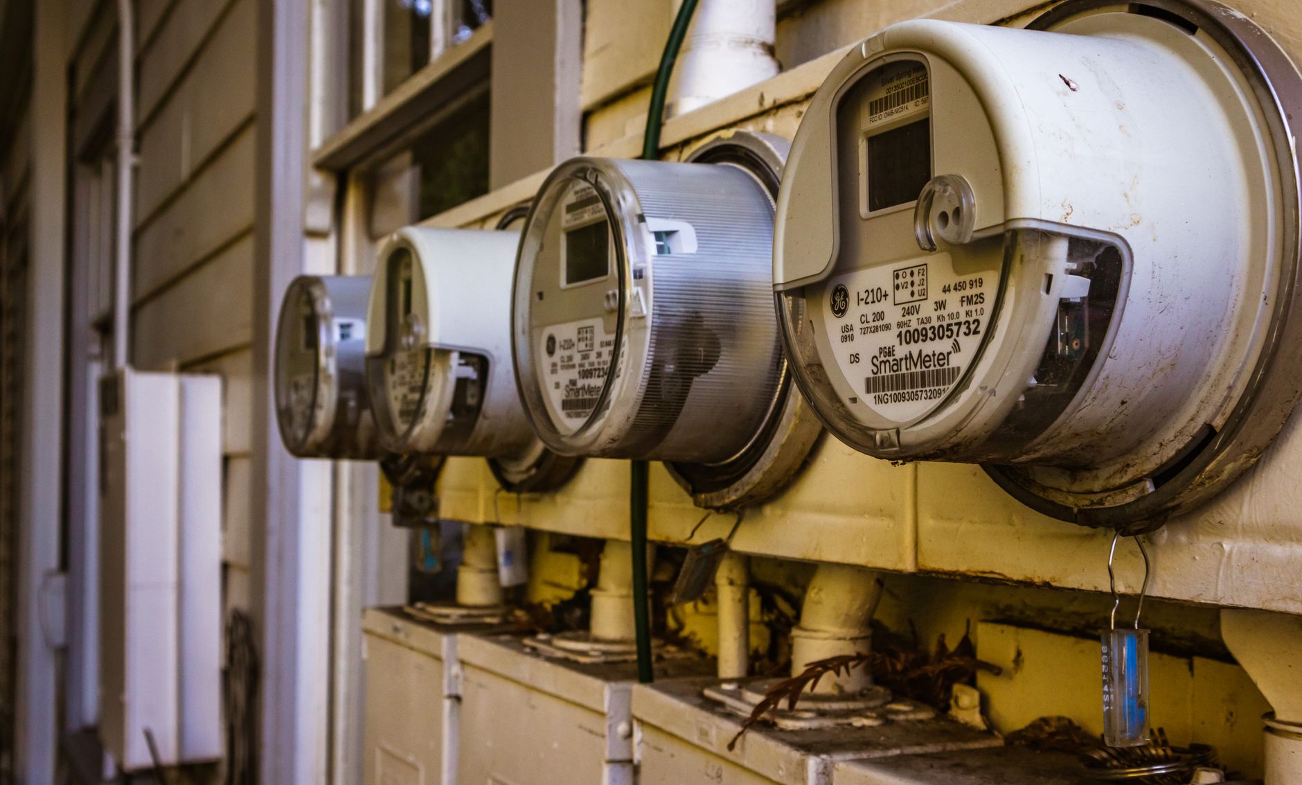 Smart electricity meters on a residential wall for measuring household energy use