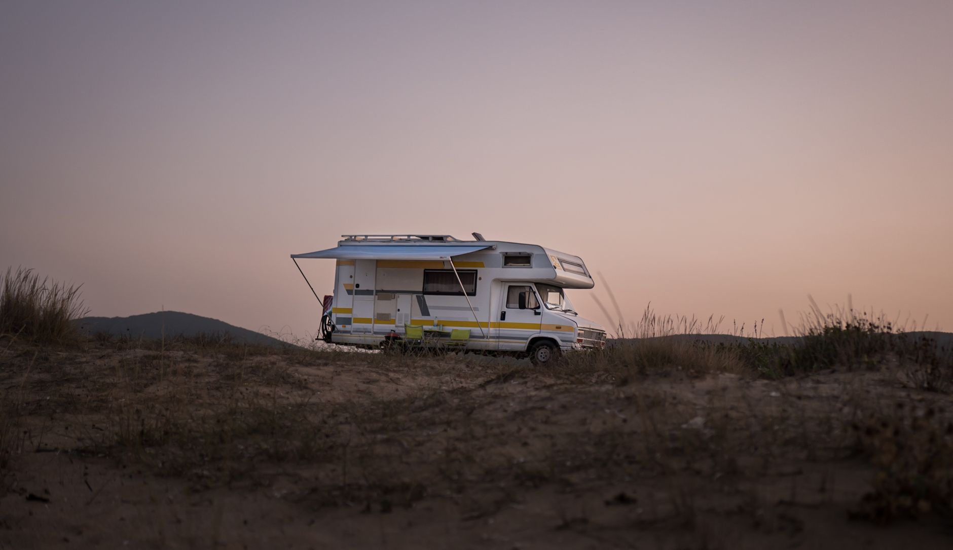 Motorhome at a scenic campsite for mobile Starlink guides