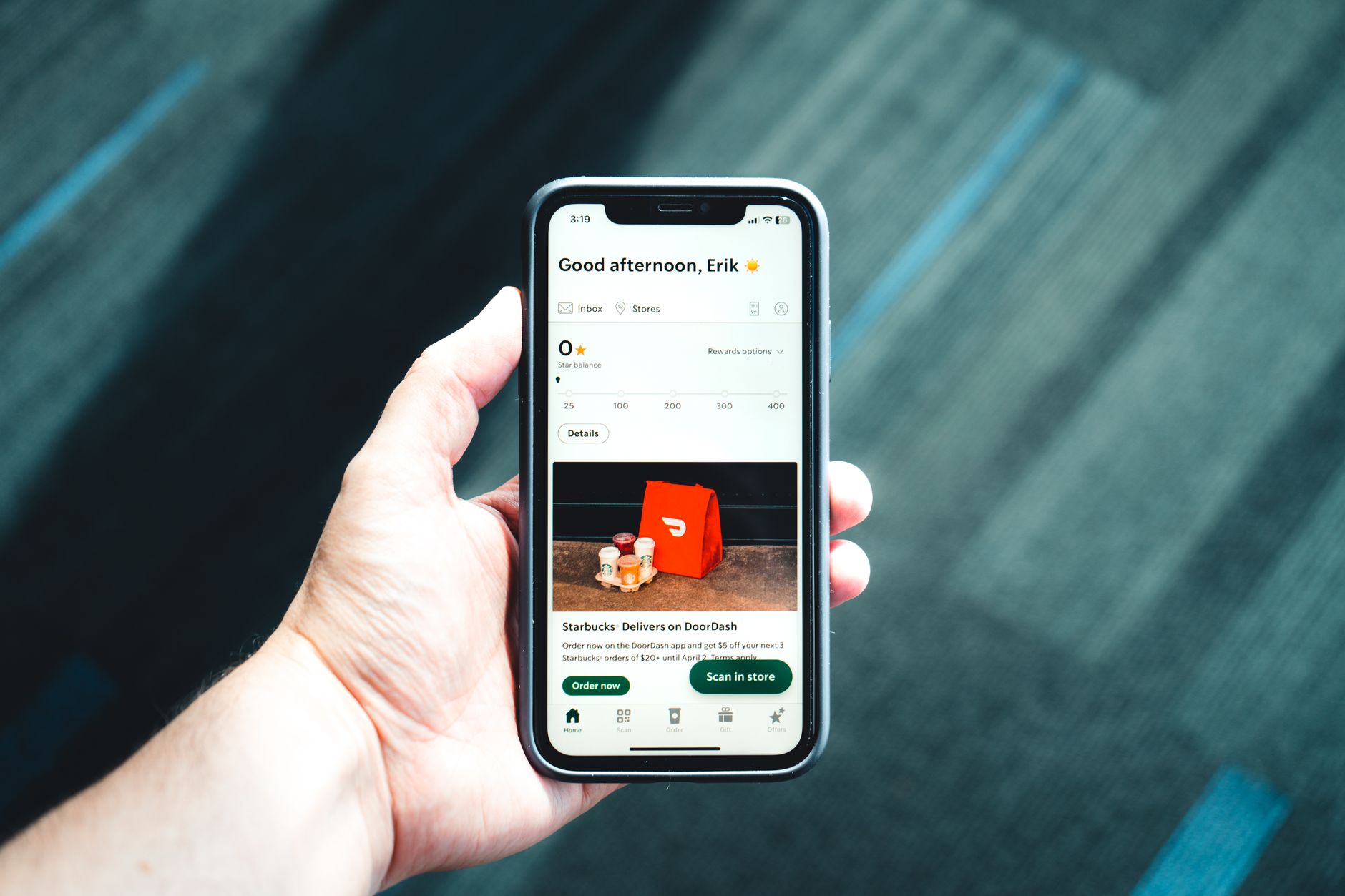 A person managing a service from a smartphone, illustrating pausing and resuming Starlink.