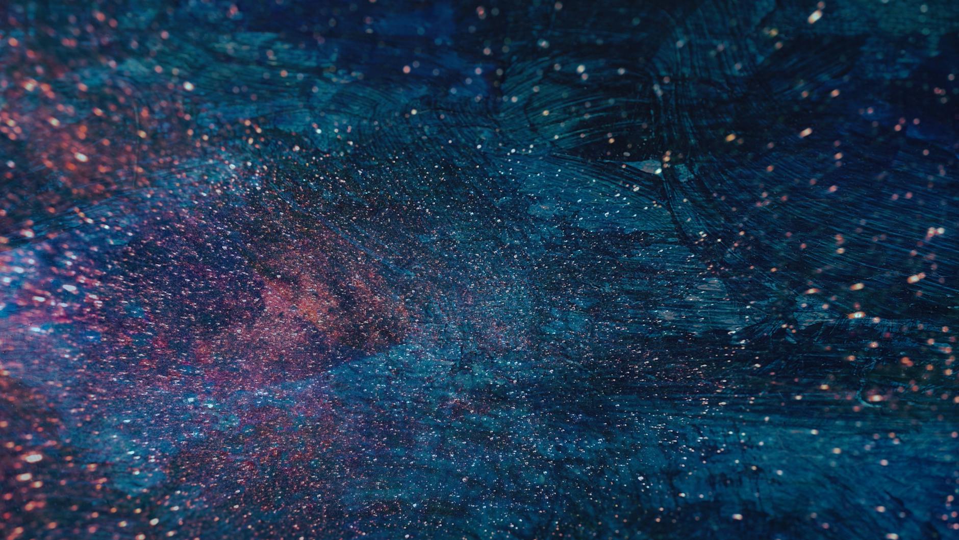Vibrant abstract artwork evoking a galaxy with blue and pink hues.