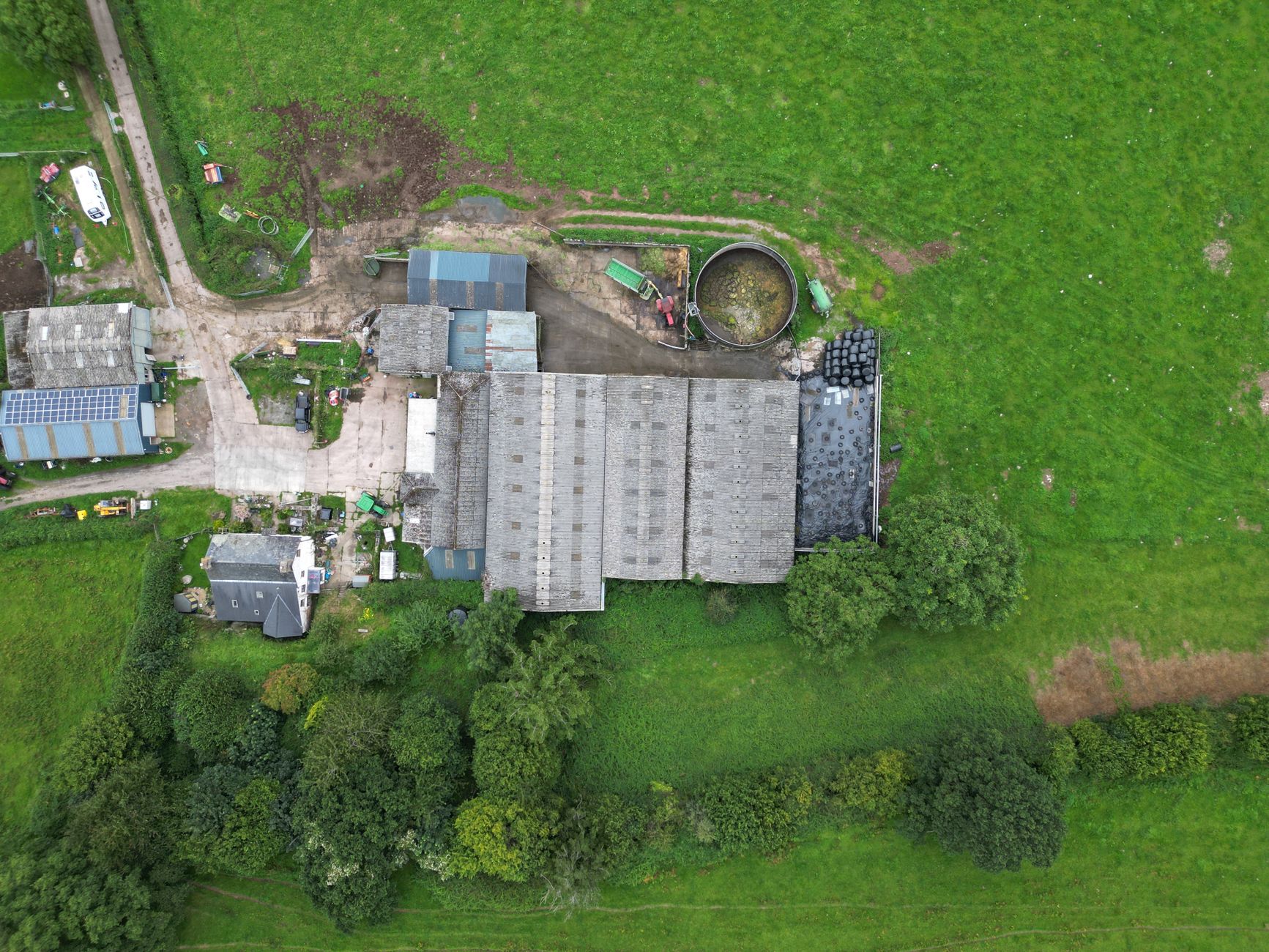 A rural UK home and farmland representing locations where Starlink can provide broadband.