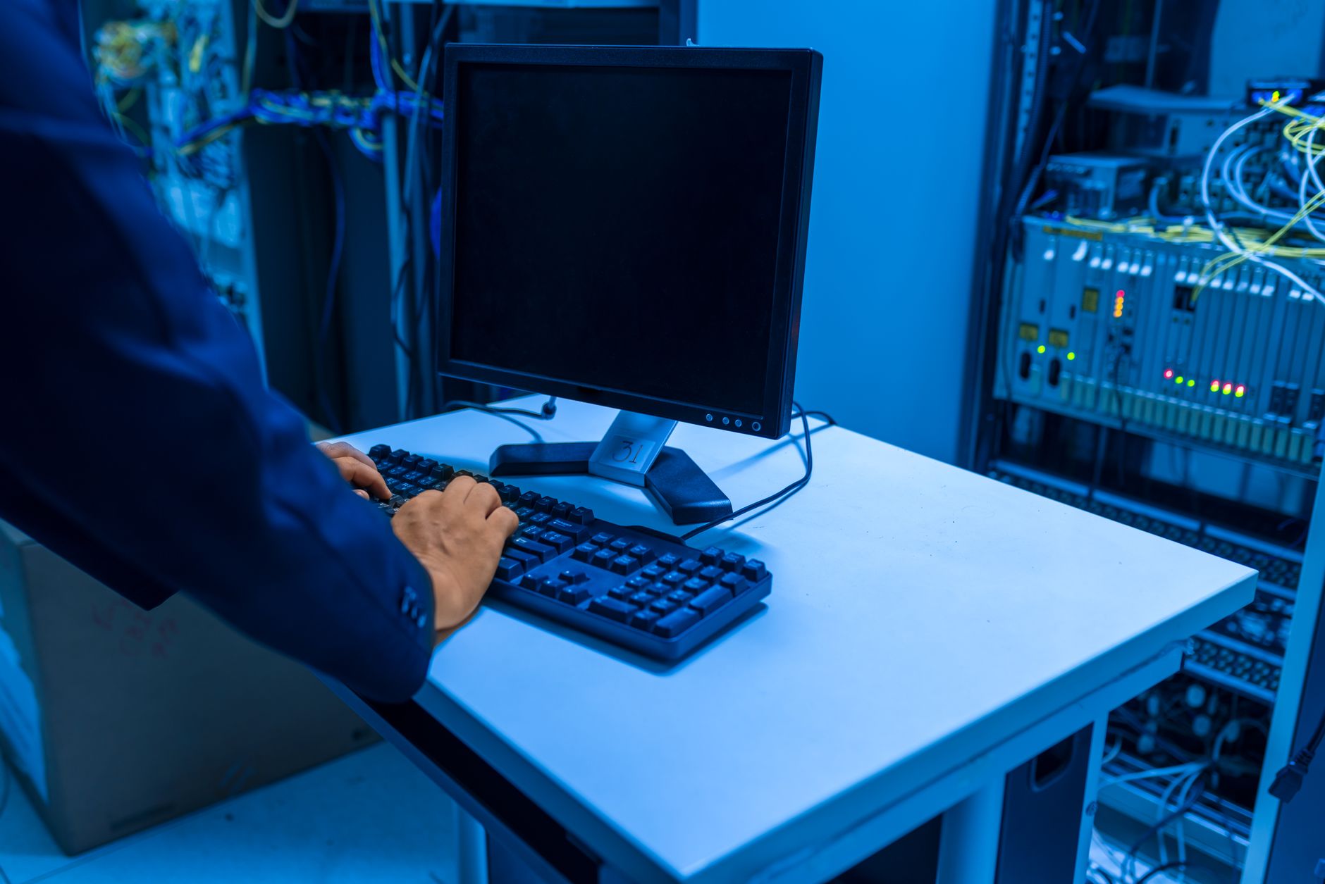 IT technician diagnosing network equipment for Starlink troubleshooting guides