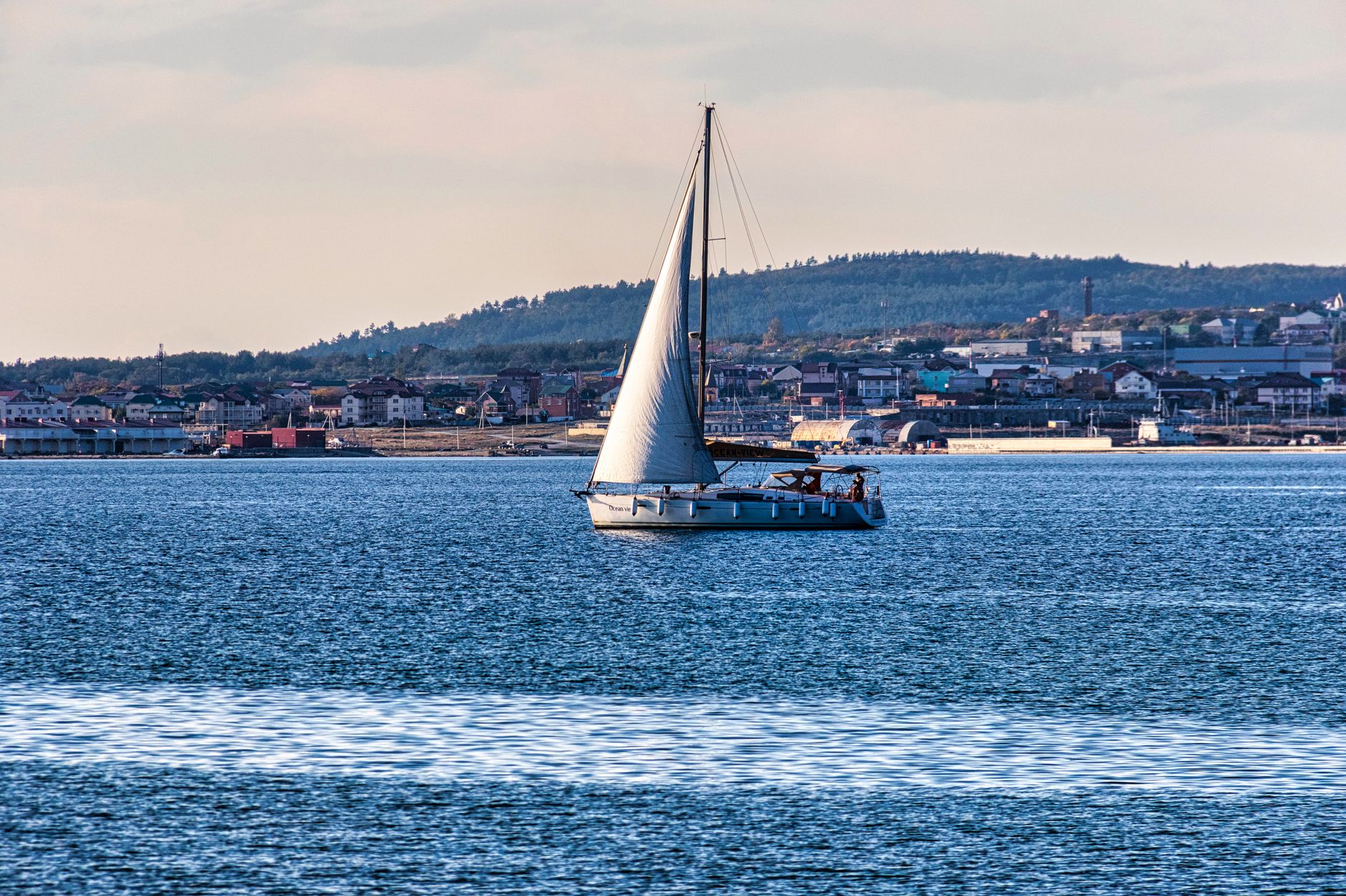 A sailboat at sea illustrating Starlink connectivity for boating and maritime use.