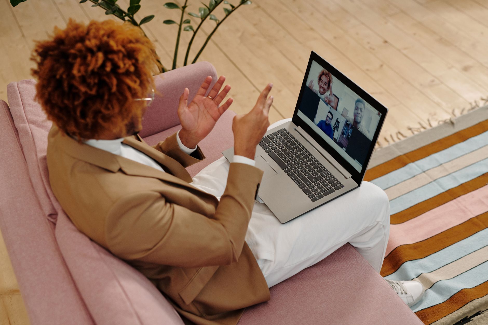 Person on a laptop video call at home